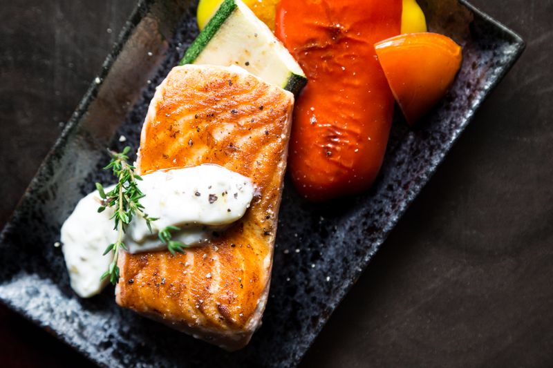 Grilled fish with charred vegetables